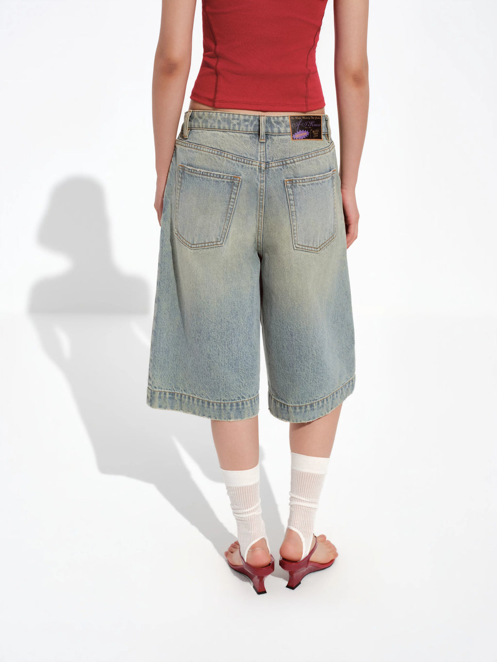 Asymmetric Waistband Mud-Wash Denim Jorts