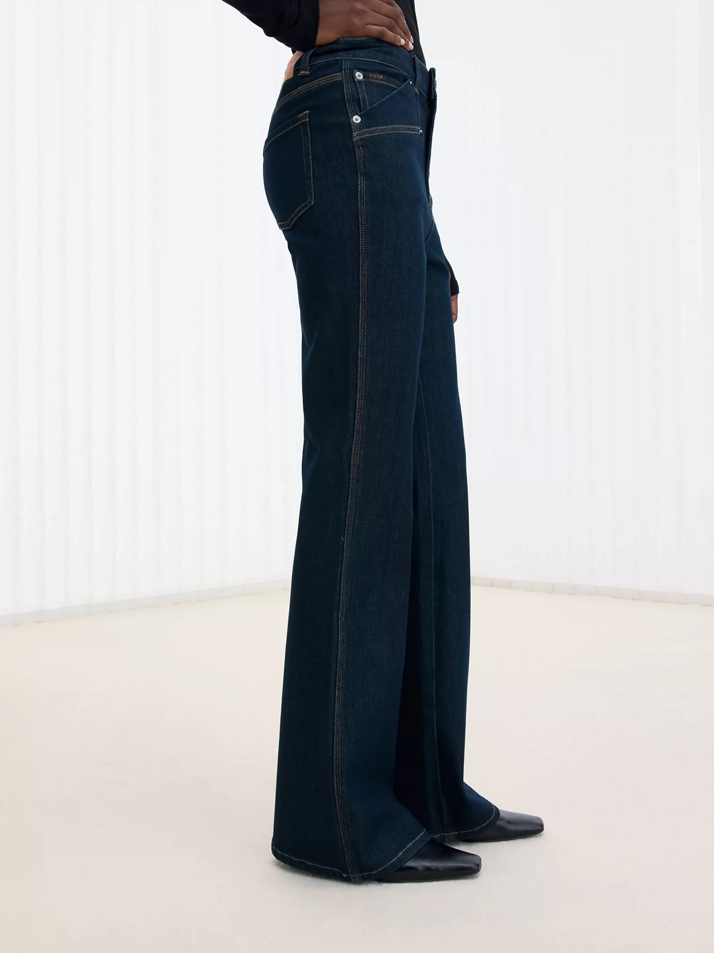 Deconstructed Green-Cast Micro-Flare Jeans