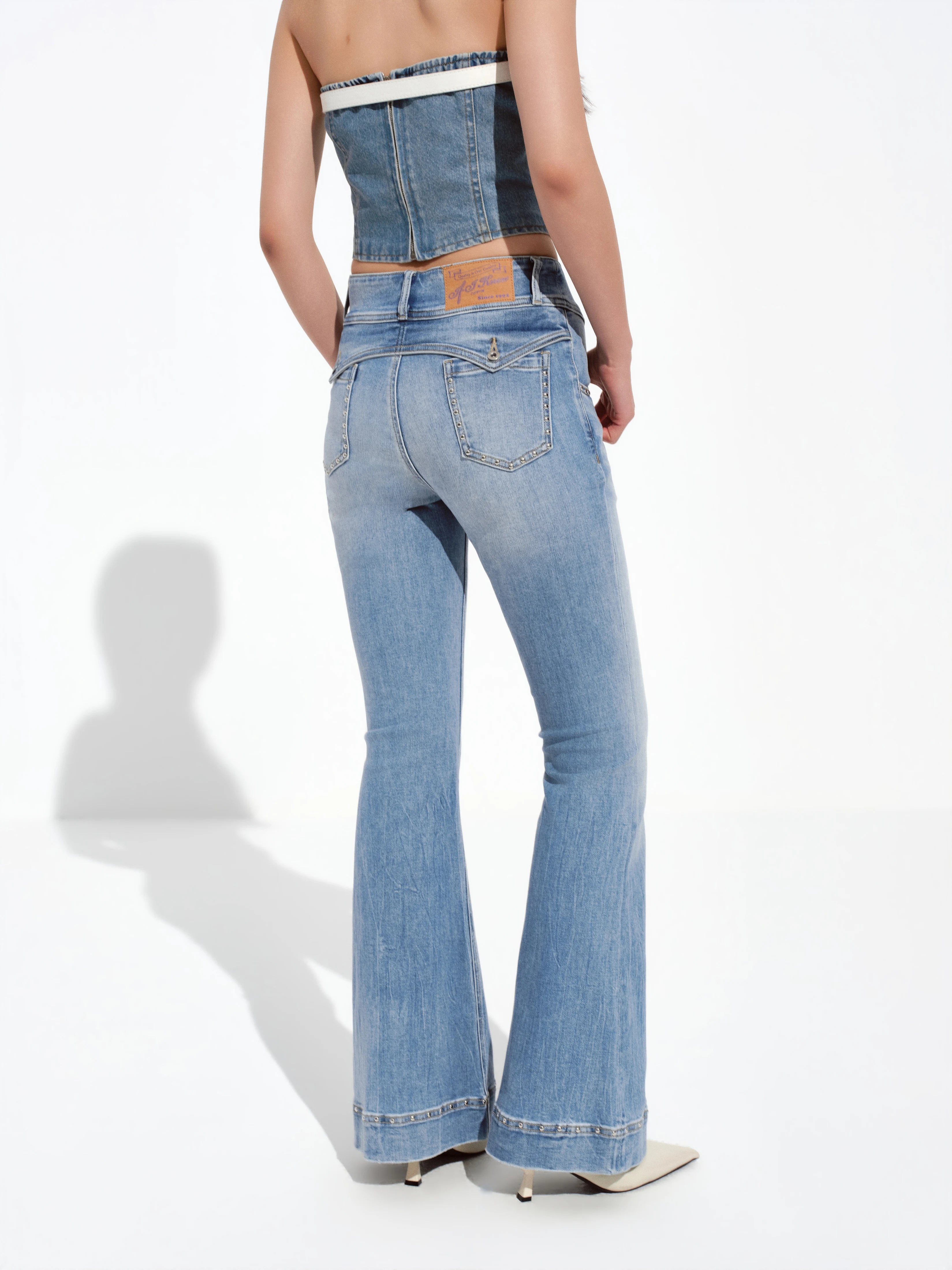All-Over Studded Slim Flared Jeans