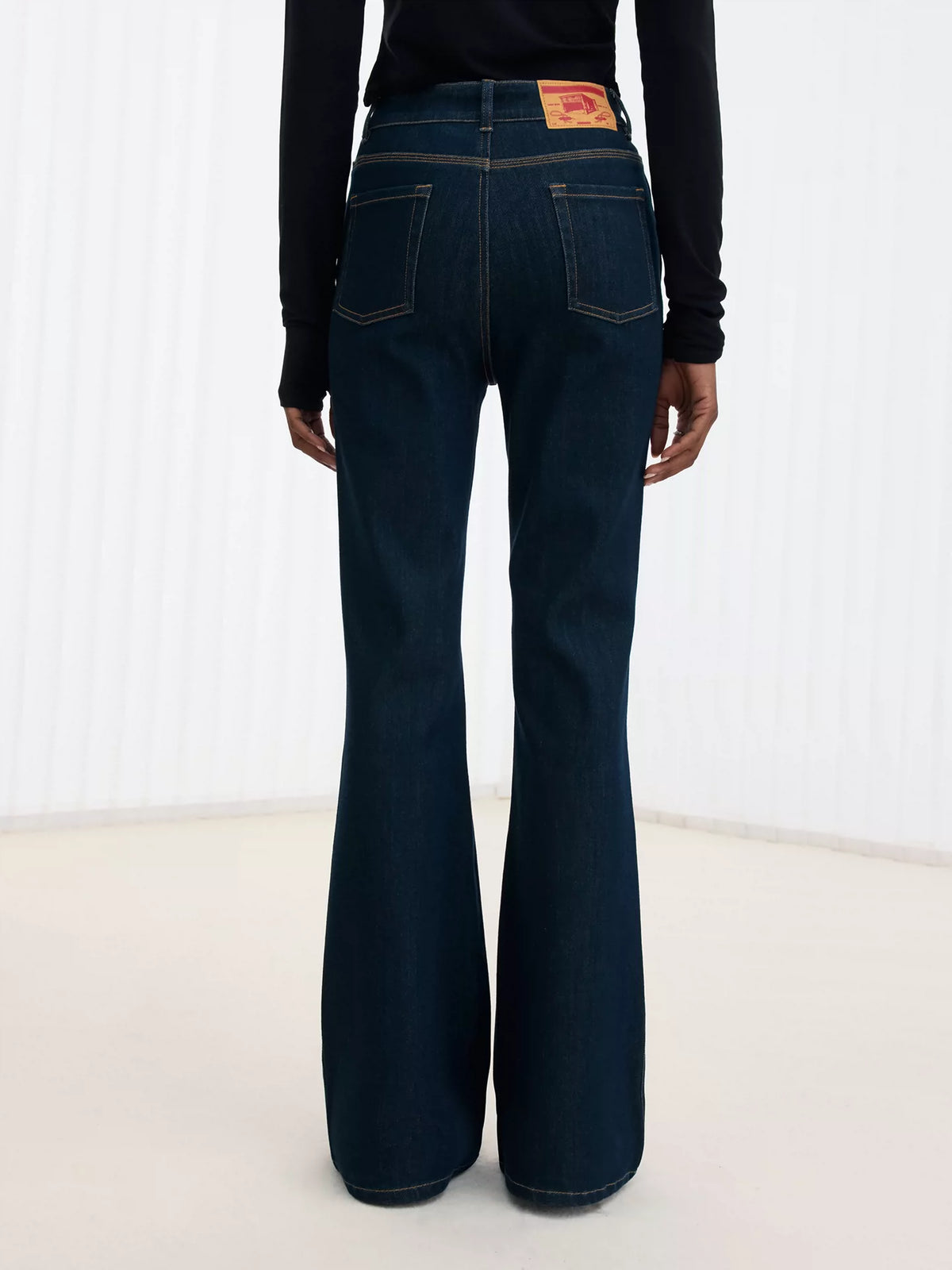 Deconstructed Green-Cast Micro-Flare Jeans